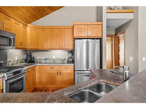 50 Ridge Road, Canmore, AB - Indoor Photo Showing Kitchen With Double Sink