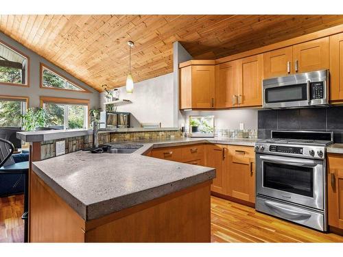 50 Ridge Road, Canmore, AB - Indoor Photo Showing Kitchen With Double Sink