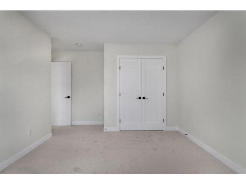 14 Ranchers Meadows, Okotoks, AB - Indoor Photo Showing Other Room