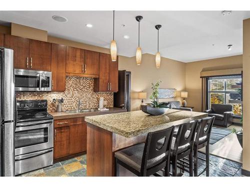 109A/B - Rot D-1818 Mountain Avenue, Canmore, AB - Indoor Photo Showing Kitchen With Stainless Steel Kitchen