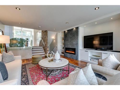 637 26 Avenue Nw, Calgary, AB - Indoor Photo Showing Living Room With Fireplace