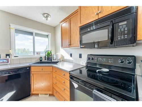 131 Covepark Way Ne, Calgary, AB - Indoor Photo Showing Kitchen