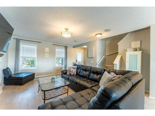 131 Covepark Way Ne, Calgary, AB - Indoor Photo Showing Living Room