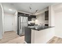 116-355 Taralake Way Ne, Calgary, AB  - Indoor Photo Showing Kitchen With Double Sink 