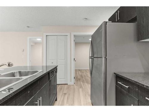 116-355 Taralake Way Ne, Calgary, AB - Indoor Photo Showing Kitchen With Double Sink