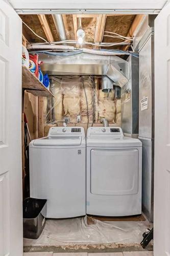 63 Somervale Place Sw, Calgary, AB - Indoor Photo Showing Laundry Room