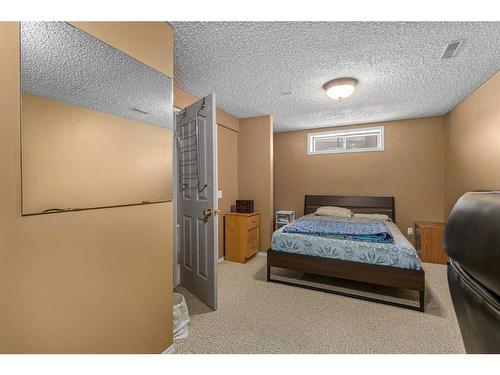 436 Mt Lorette Place Se, Calgary, AB - Indoor Photo Showing Bedroom