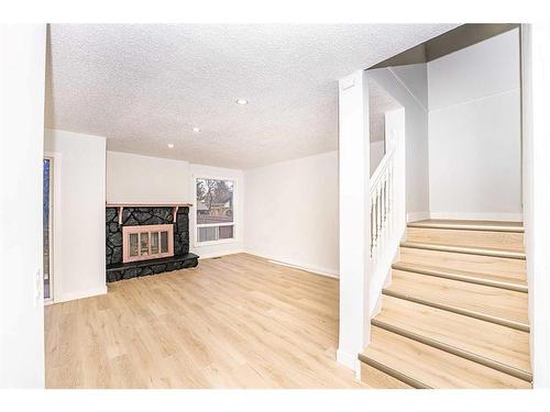 4 Abergale Close Ne, Calgary, AB - Indoor With Fireplace