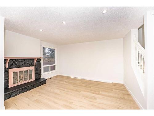 4 Abergale Close Ne, Calgary, AB - Indoor With Fireplace