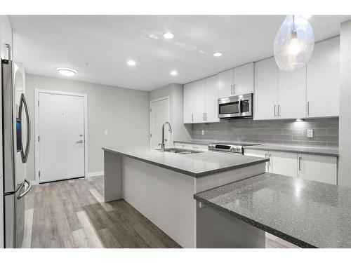 310-8531 8A Avenue Sw, Calgary, AB - Indoor Photo Showing Kitchen