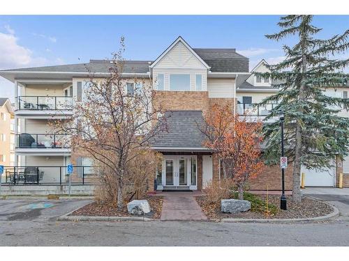 1104-950 Arbour Lake Road Nw, Calgary, AB - Outdoor With Balcony With Facade