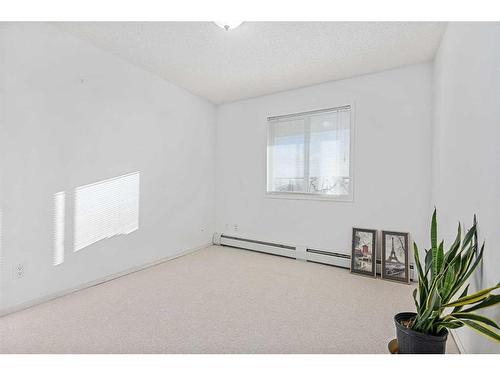 1104-950 Arbour Lake Road Nw, Calgary, AB - Indoor Photo Showing Other Room