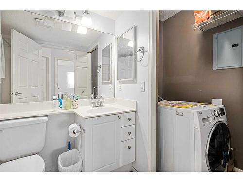 1104-950 Arbour Lake Road Nw, Calgary, AB - Indoor Photo Showing Laundry Room