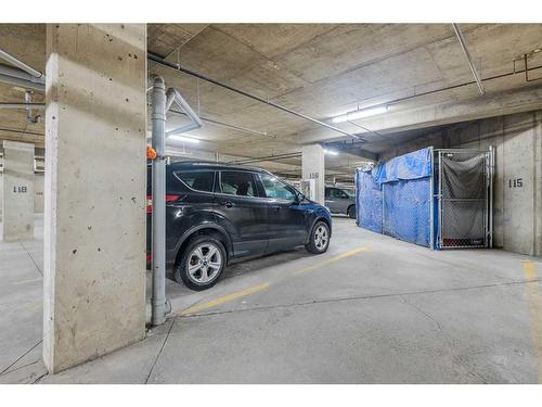 1104-950 Arbour Lake Road Nw, Calgary, AB - Indoor Photo Showing Garage