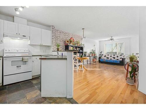 1104-950 Arbour Lake Road Nw, Calgary, AB - Indoor Photo Showing Kitchen