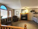 4236 Shannon Drive, Olds, AB  - Indoor Photo Showing Living Room With Fireplace 