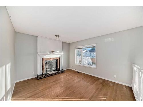 63 Harvest Wood Way Ne, Calgary, AB - Indoor Photo Showing Living Room With Fireplace