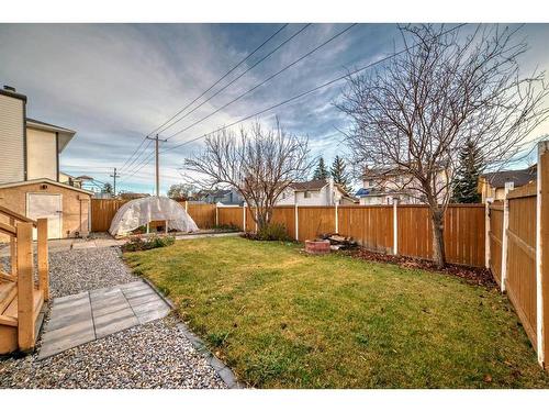 63 Harvest Wood Way Ne, Calgary, AB - Outdoor With Backyard