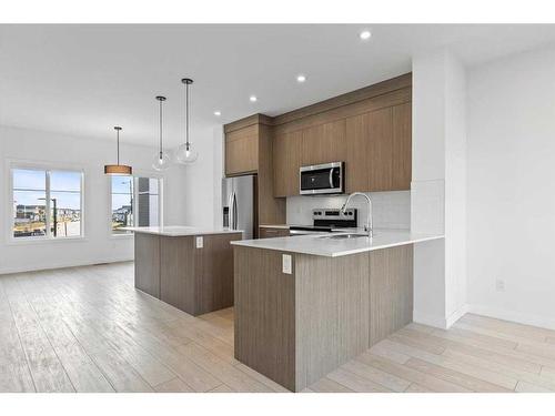 804-6 Merganser Drive West, Chestermere, AB - Indoor Photo Showing Kitchen With Stainless Steel Kitchen With Upgraded Kitchen