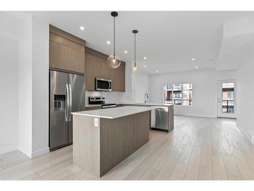 804-6 Merganser Drive West, Chestermere, AB - Indoor Photo Showing Kitchen With Stainless Steel Kitchen With Upgraded Kitchen