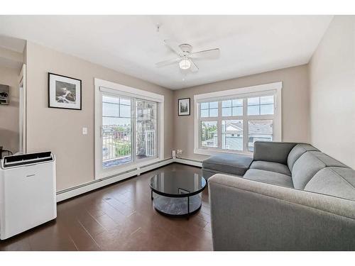 3309-11 Mahogany Row Se, Calgary, AB - Indoor Photo Showing Living Room