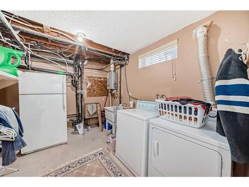 935 Hunterston Hill Nw, Calgary, AB - Indoor Photo Showing Laundry Room