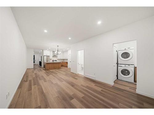 109 5 Avenue Se, High River, AB - Indoor Photo Showing Laundry Room