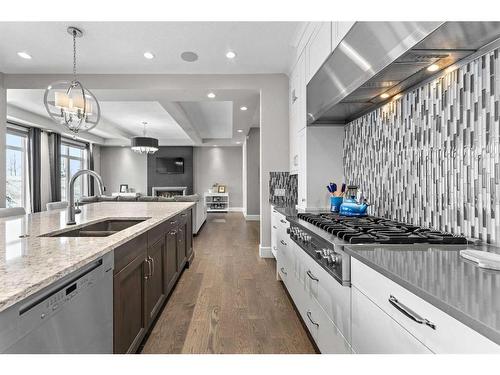 41 Waters Edge Drive, Heritage Pointe, AB - Indoor Photo Showing Kitchen With Double Sink With Upgraded Kitchen