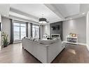 41 Waters Edge Drive, Heritage Pointe, AB  - Indoor Photo Showing Living Room With Fireplace 