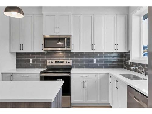 483 Sage Hill Road Nw, Calgary, AB - Indoor Photo Showing Kitchen With Double Sink With Upgraded Kitchen