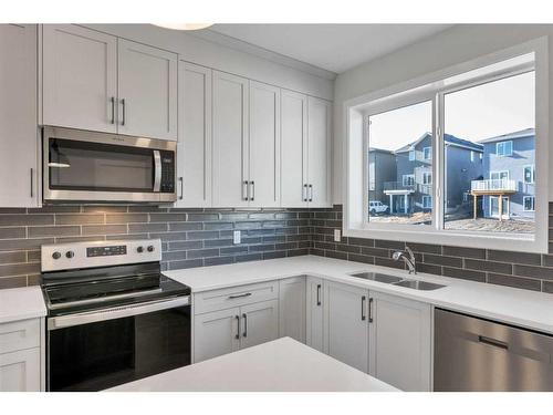 483 Sage Hill Road Nw, Calgary, AB - Indoor Photo Showing Kitchen With Stainless Steel Kitchen With Double Sink With Upgraded Kitchen