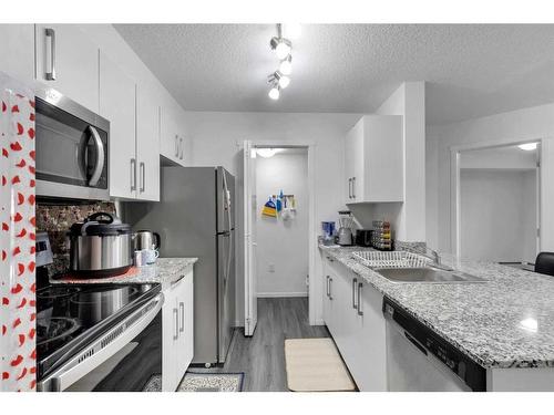 3207-4641 128 Avenue Ne, Calgary, AB - Indoor Photo Showing Kitchen With Upgraded Kitchen