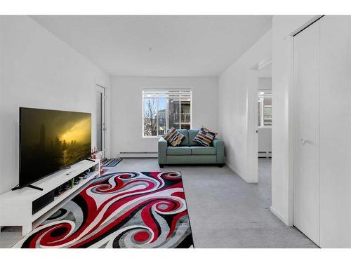 3207-4641 128 Avenue Ne, Calgary, AB - Indoor Photo Showing Living Room