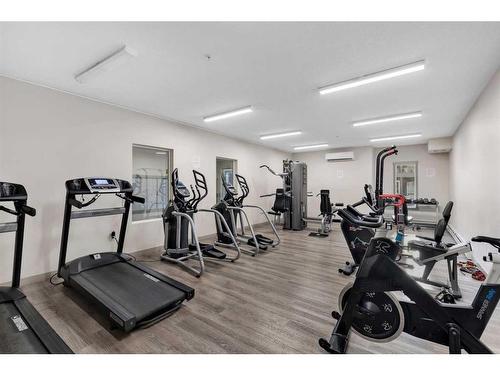 3207-4641 128 Avenue Ne, Calgary, AB - Indoor Photo Showing Gym Room