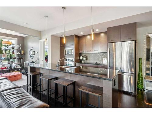 103-540 34 Street Nw, Calgary, AB - Indoor Photo Showing Kitchen With Upgraded Kitchen