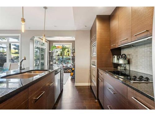 103-540 34 Street Nw, Calgary, AB - Indoor Photo Showing Kitchen With Upgraded Kitchen