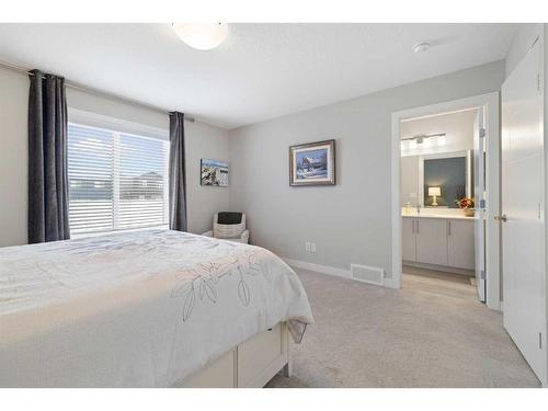 30 D'Arcy Boulevard, Okotoks, AB - Indoor Photo Showing Bedroom