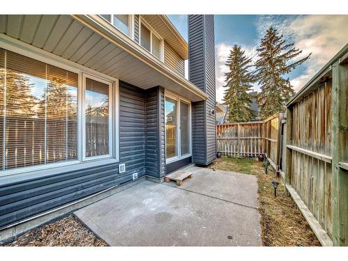 148-54 Glamis Green Sw, Calgary, AB - Outdoor With Deck Patio Veranda With Exterior