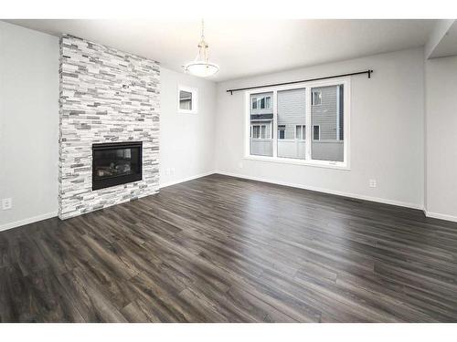 342 Yorkville Road Sw, Calgary, AB - Indoor Photo Showing Living Room With Fireplace