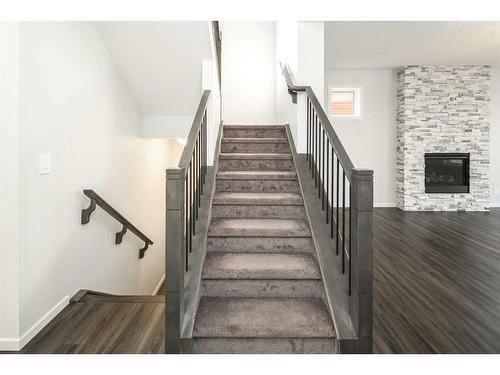 342 Yorkville Road Sw, Calgary, AB - Indoor Photo Showing Other Room With Fireplace