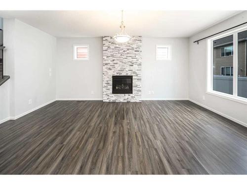 342 Yorkville Road Sw, Calgary, AB - Indoor Photo Showing Living Room With Fireplace