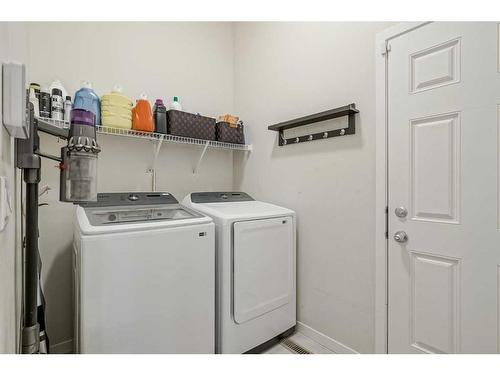 170 Brightonwoods Grove Se, Calgary, AB - Indoor Photo Showing Laundry Room