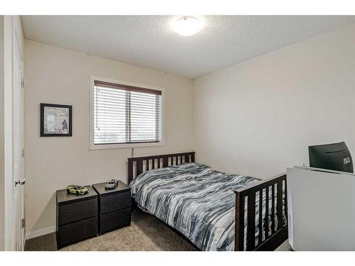 170 Brightonwoods Grove Se, Calgary, AB - Indoor Photo Showing Bedroom