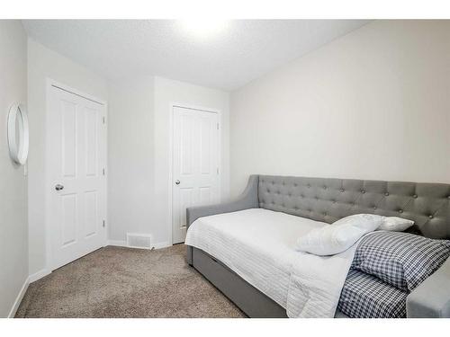 170 Brightonwoods Grove Se, Calgary, AB - Indoor Photo Showing Bedroom