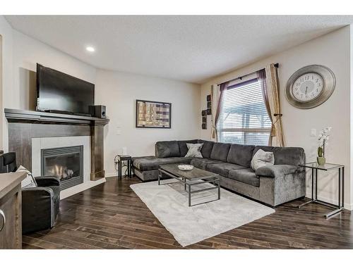 170 Brightonwoods Grove Se, Calgary, AB - Indoor Photo Showing Living Room With Fireplace