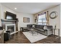 170 Brightonwoods Grove Se, Calgary, AB  - Indoor Photo Showing Living Room With Fireplace 