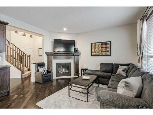 170 Brightonwoods Grove Se, Calgary, AB - Indoor Photo Showing Living Room With Fireplace