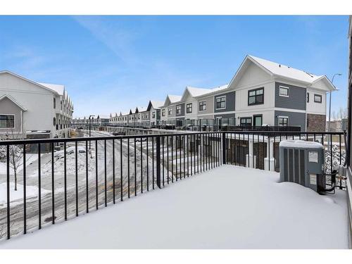 111 Les Jardins Park Se, Calgary, AB - Outdoor With Balcony