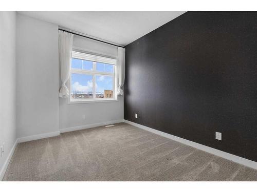 111 Les Jardins Park Se, Calgary, AB - Indoor Photo Showing Other Room