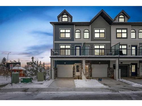 111 Les Jardins Park Se, Calgary, AB - Outdoor With Balcony With Facade